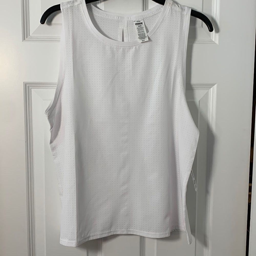 RBX Size Medium white athletic top.  NWT. Four-way stretch flexibility & wicking